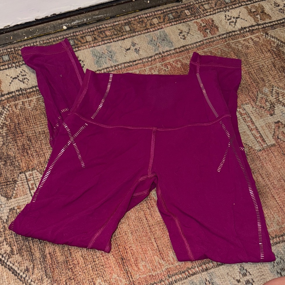 Lululemon “like new” plum leggings full length with metallic accents